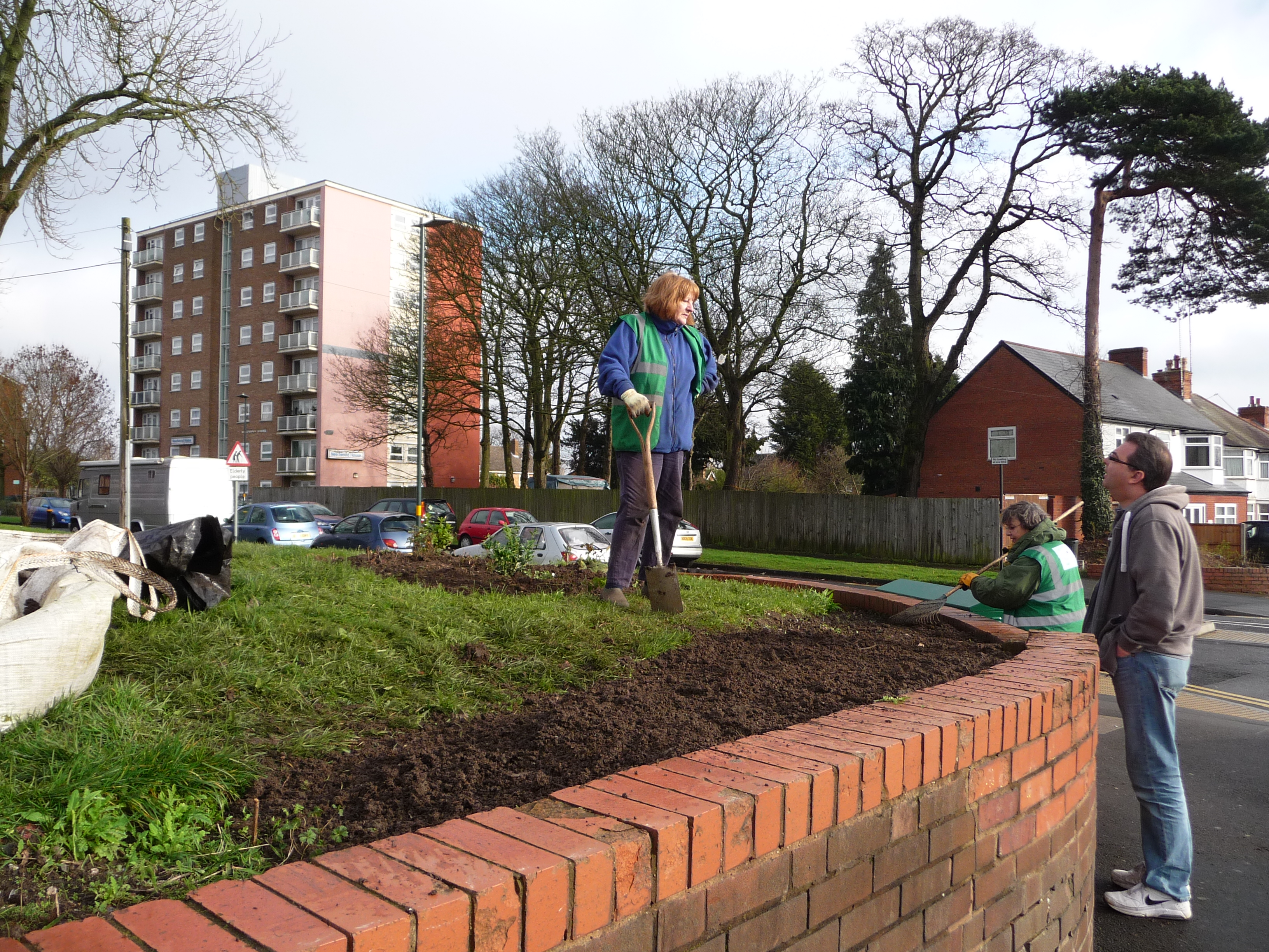 Fran and Ann working of corner of Woodcock Lane, Jan 14