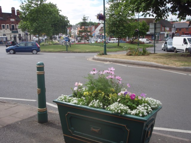 One of the existing colourful planters with flowers from Jeffries